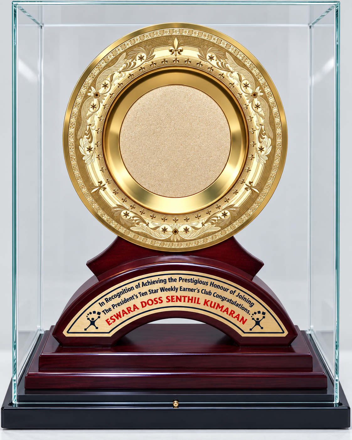 Angled view of the Ten-Star trophy in its glass case on a mahogany base